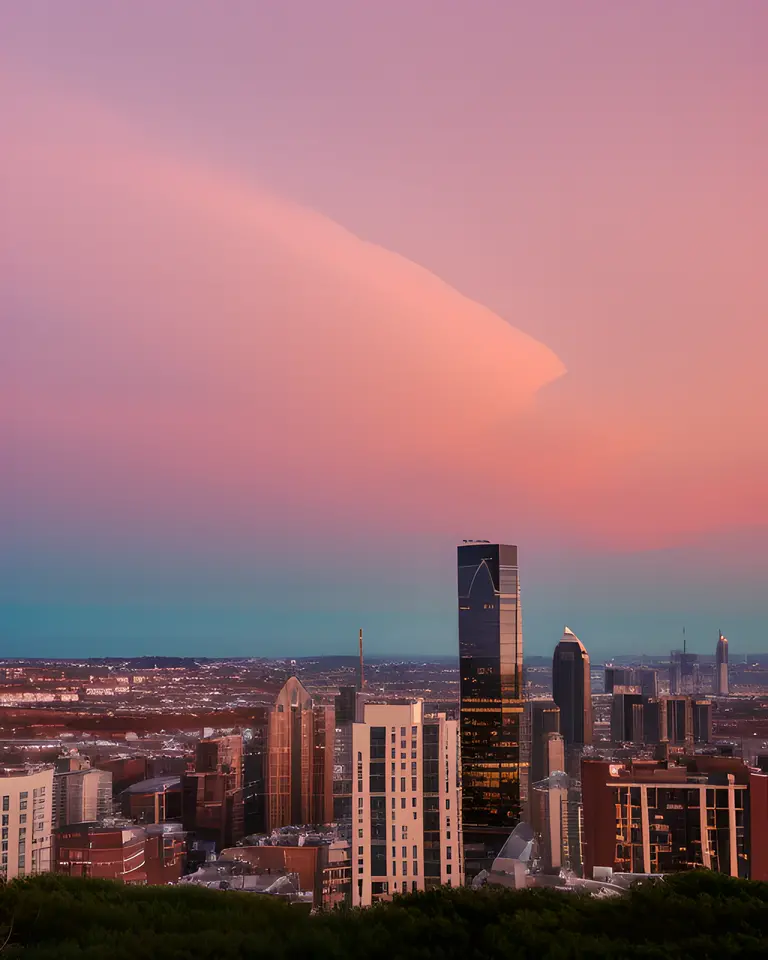 Stunning Cityscape at Sunset with Modern High-Rise Building Focus